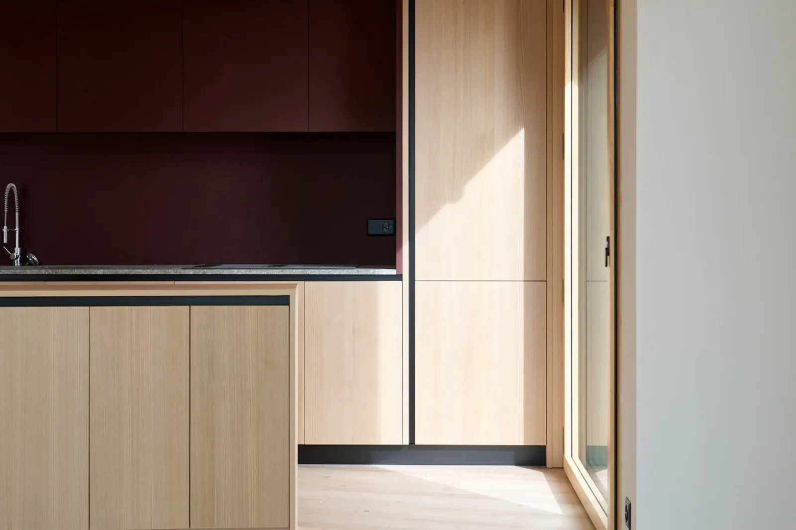 A timber kitchen with an oak island