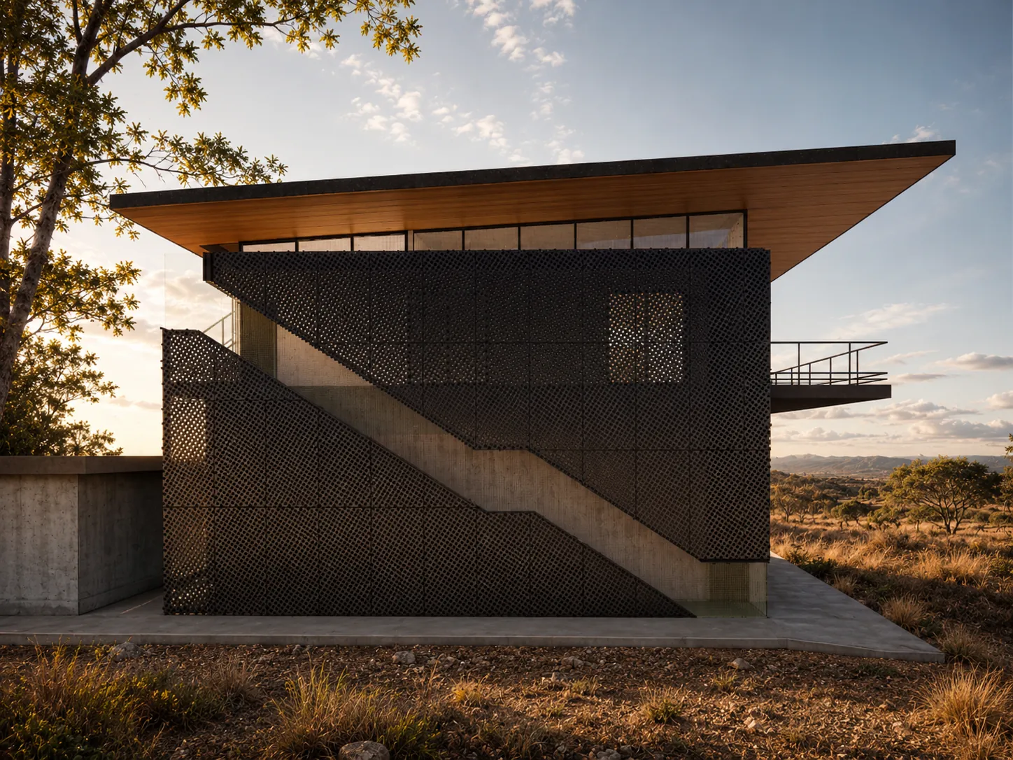Dark perforated screen facade with an exterior stair under a floating roof