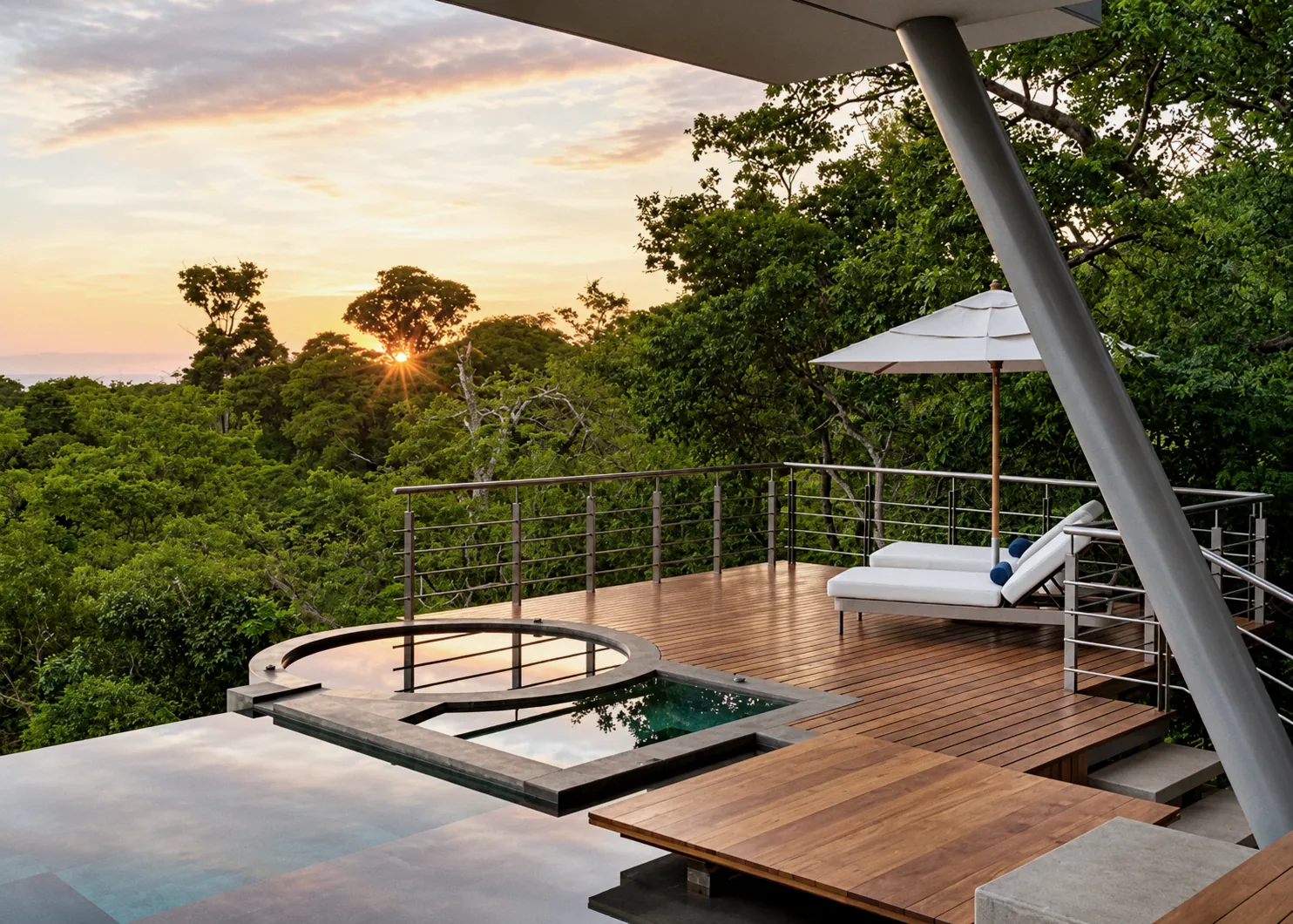 Terrace with a round plunge pool and loungers at sunset over the dry forest