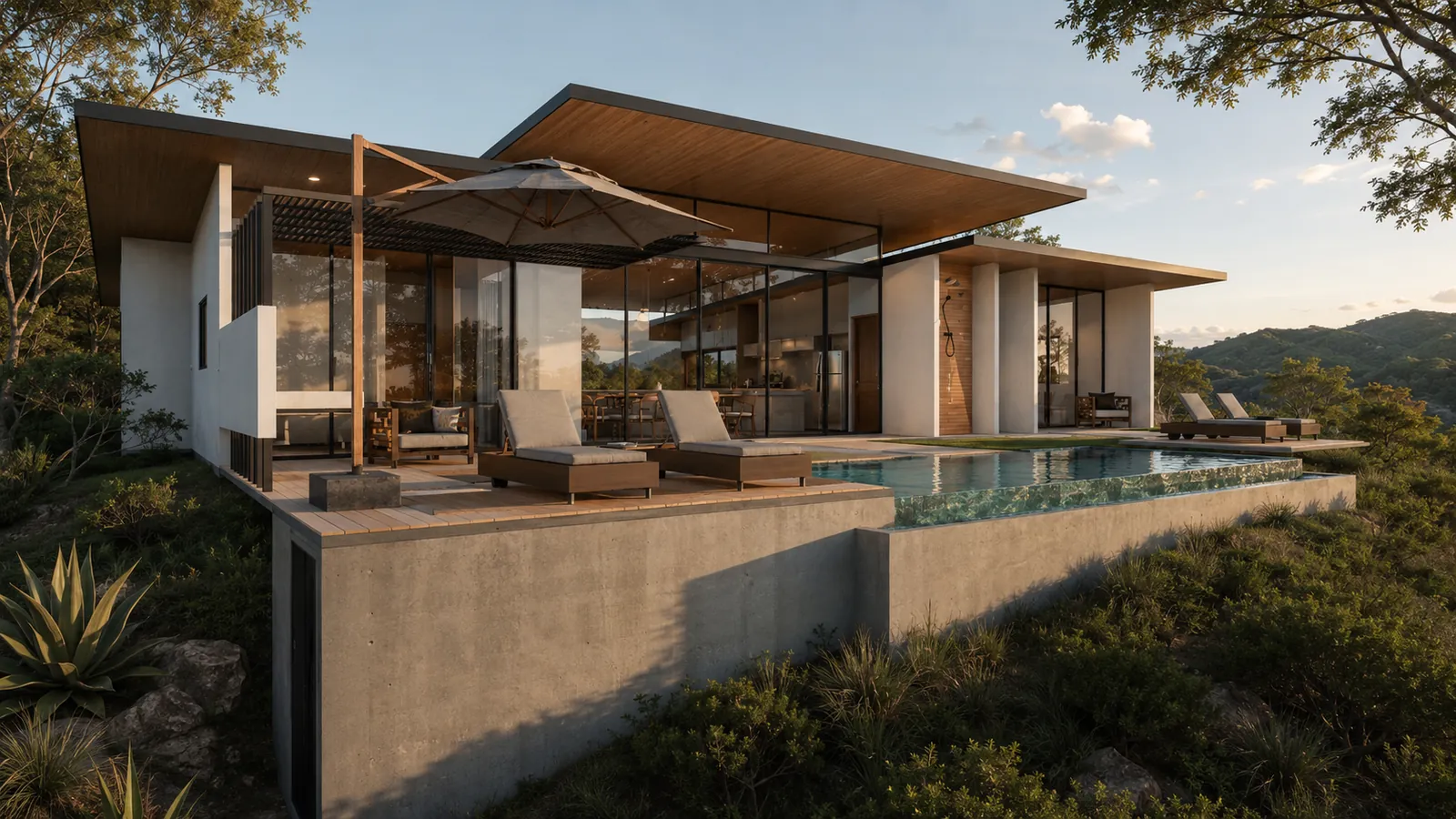 Two-storey house with an infinity pool on a concrete plinth above dry forest